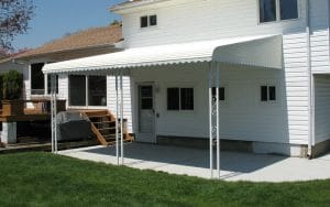 Aluminum canopy with uprights over residential patio in Minnesota