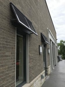 Close up of metal shutter awning in Twin Cities