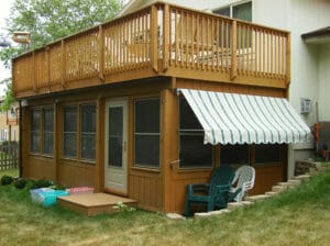 Adjustable awning off sun porch in Minneapolis