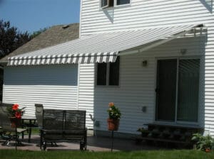 Patio cover with adjustable arms and motor by Acme Awning