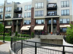 Retractable awnings create a sleek and modern look at this Twin Cities condo development