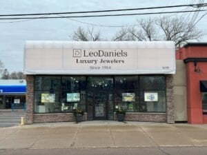 LeoDaniels new modern backlit awning by Acme Awning of Minneapolis features white canvas with black lettering