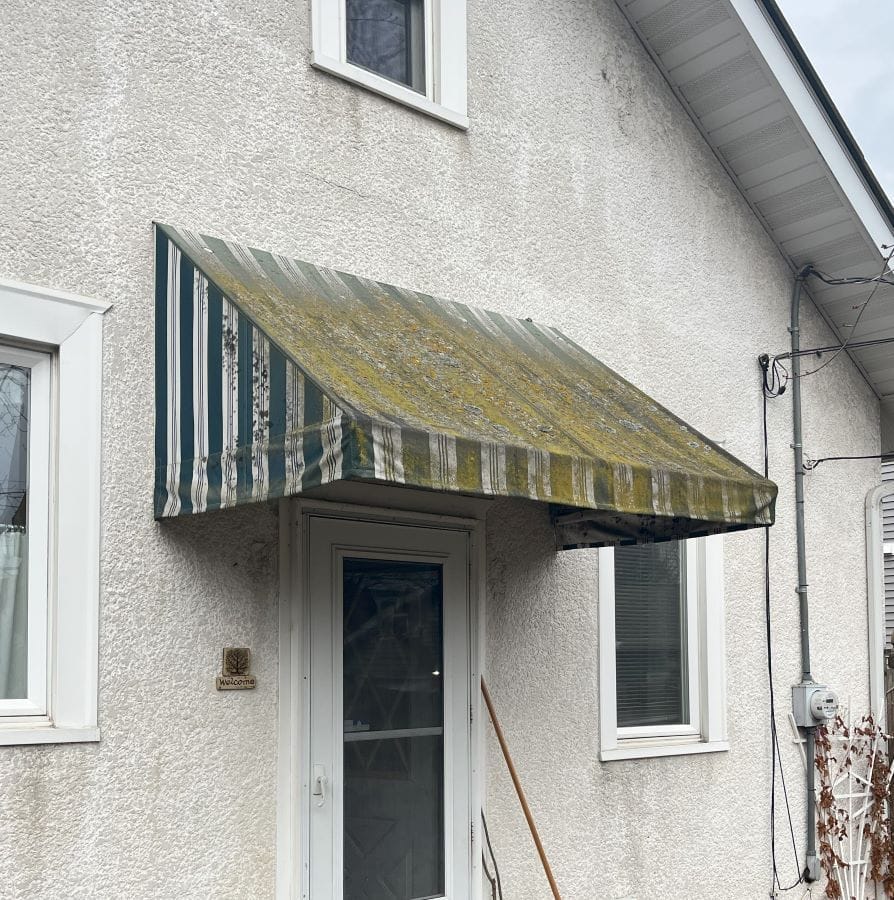Awning that needs spring cleaning in the Twin Cities