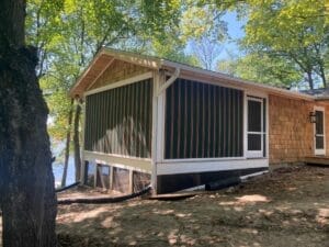 Motorized screens in a closed position at a lake house in MN