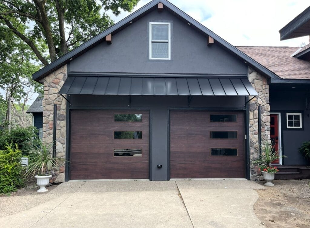 Standing seam awning over a residential garage